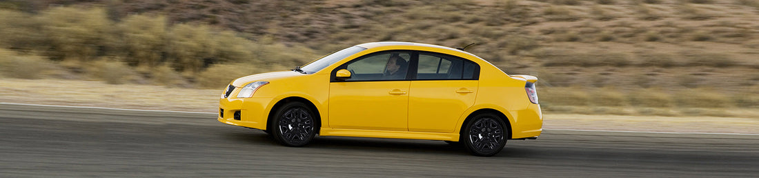 Winjet 16 inch hubcaps for 2007-2012 Nissan Sentra - black lacquer wheel covers