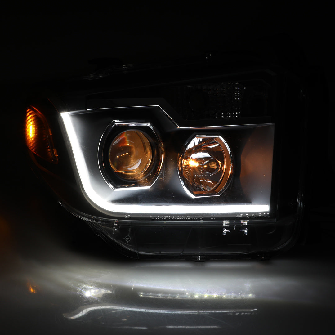 2014-2019 Toyota Tundra Projector Headlights with LED Switchback Sequential DRL Light Bar - Black/Clear