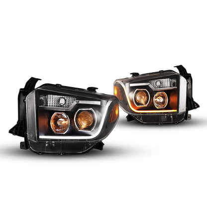 2014-2019 Toyota Tundra Projector Headlights with LED Switchback Sequential DRL Light Bar - Black/Clear